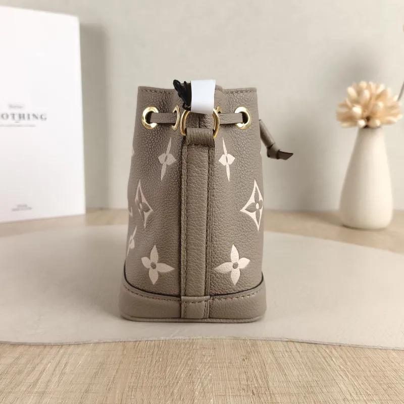 Louis Vuitton Crossbody Bag NANO NOÉ Bucket Bag Nano · White Empreinte Embossed Calfskin nano 13 × 10 × 16 cm — detail view 6 of 10