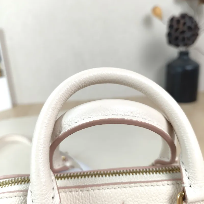 Louis Vuitton Crossbody Bag Speedy20Beige · Pink Empreinte Embossed Calfskin Small20.5 × 12 × 13.5 cm — detail view 5 of 12