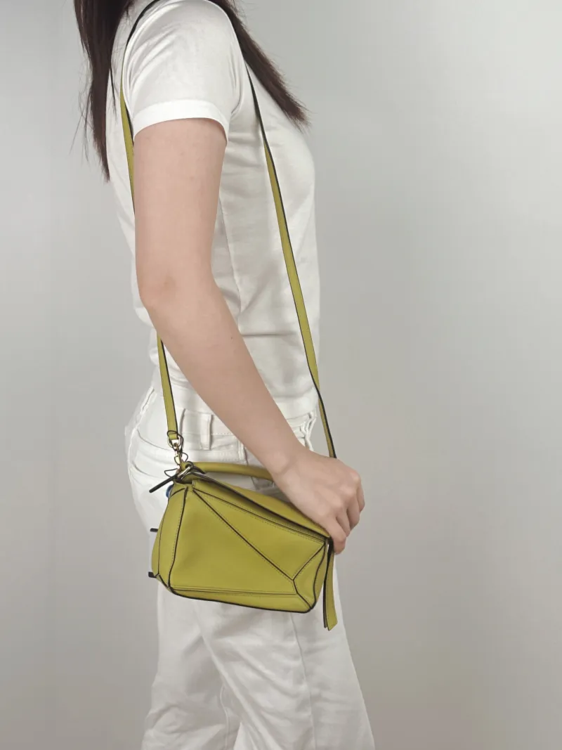 LOEWE Crossbody Bag Puzzle Green Calfskinmini18 × 8 × 12.5 cm — on-model view 2 of 3