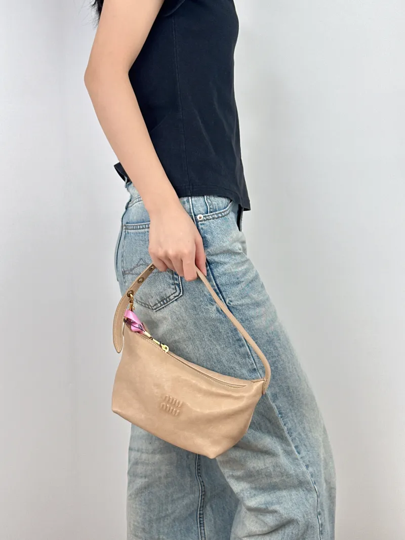 Miumiu Top Handle Bag Spirit Vanity Case Bag Cosmetic Bag Lambskin One Size18.5 × 10 × 14 cm — on-model view 1 of 3