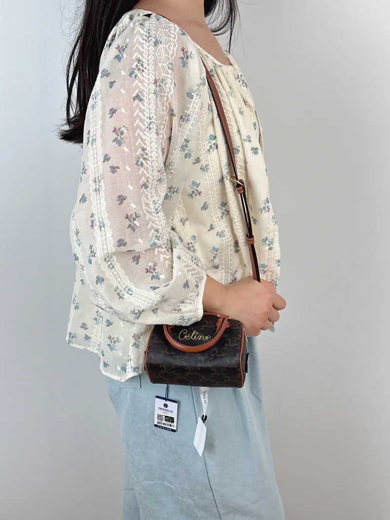 CELINE Crossbody Bag Monogram PV Cmini14 × 7.5 × 9.5 cm — on-model view 3 of 3