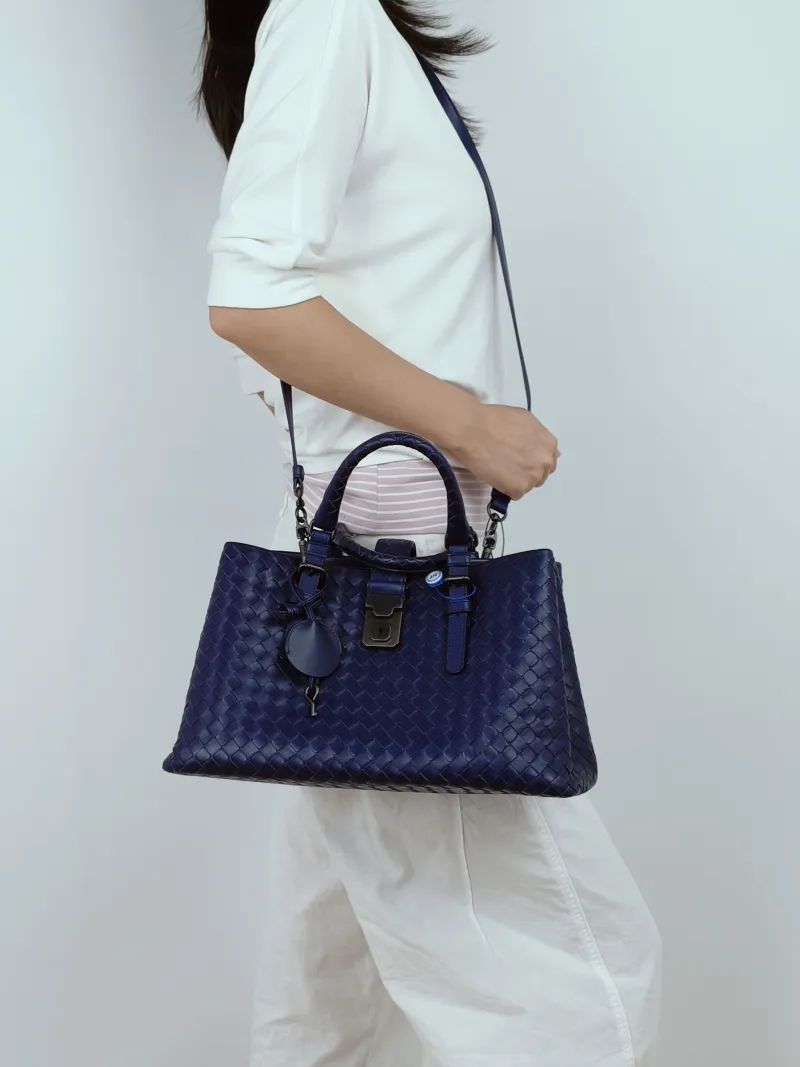 Bottega Veneta Top Handle Bag Roma Calfskin One Size31 × 15 × 20 cm — on-model view 1 of 3