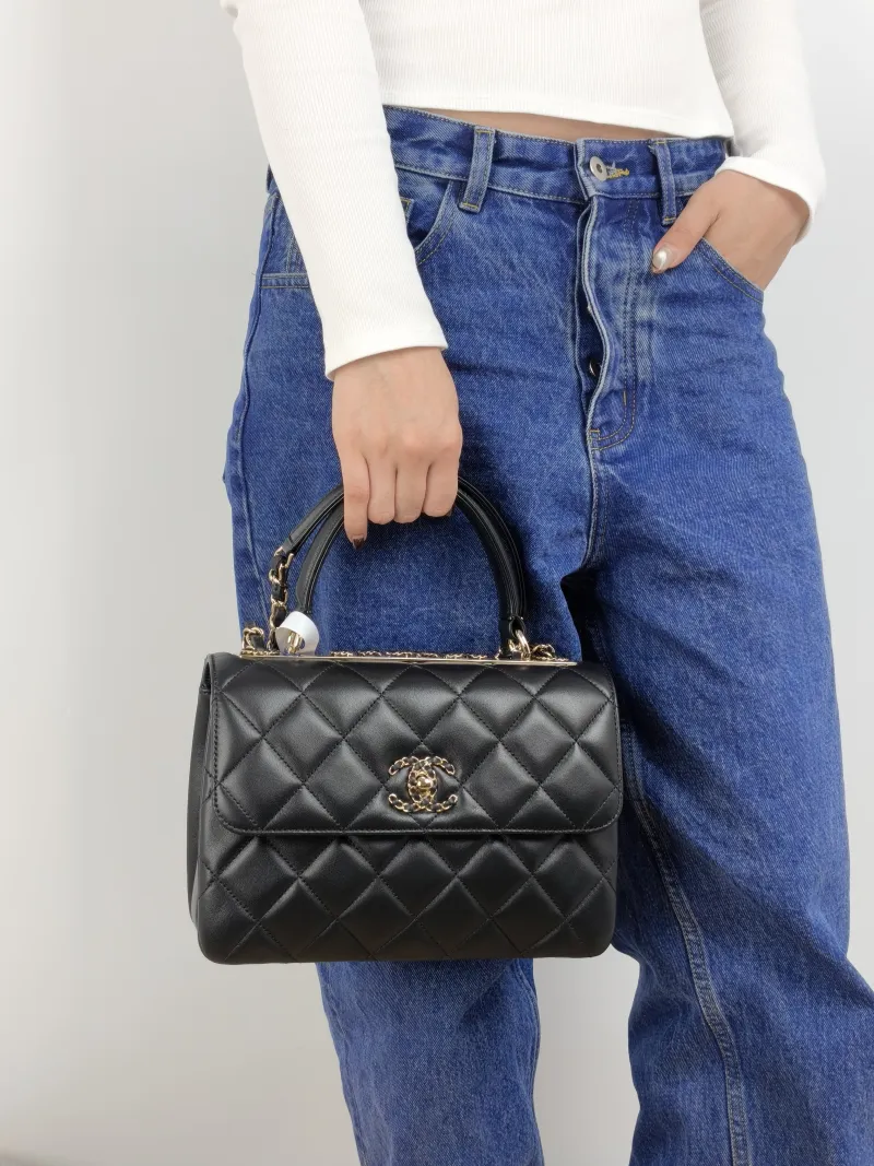 Chanel Crossbody Bag 23s trendy cc Black Lambskin Small 25 × 12 × 17 cm — on-model view 1 of 2