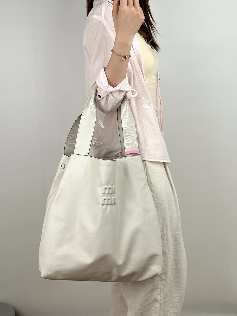 Miumiu Crossbody Bag Tote Bag White Calfskin One Size 37 × 11 × 37 cm — on-model view 1 of 2