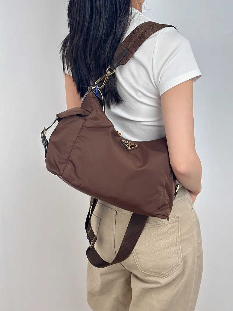 PRADA Shoulder Bag Explore Messenger Bag Nylon Large 32 × 11.5 × 22 cm — on-model view 2 of 3
