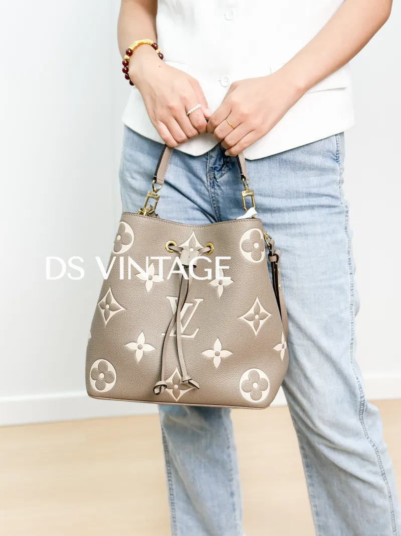 Louis Vuitton Crossbody Bag NANO NOÉ Bucket Bag Nano · White Empreinte Embossed Calfskin nano 13 × 10 × 16 cm — on-model view 2 of 3