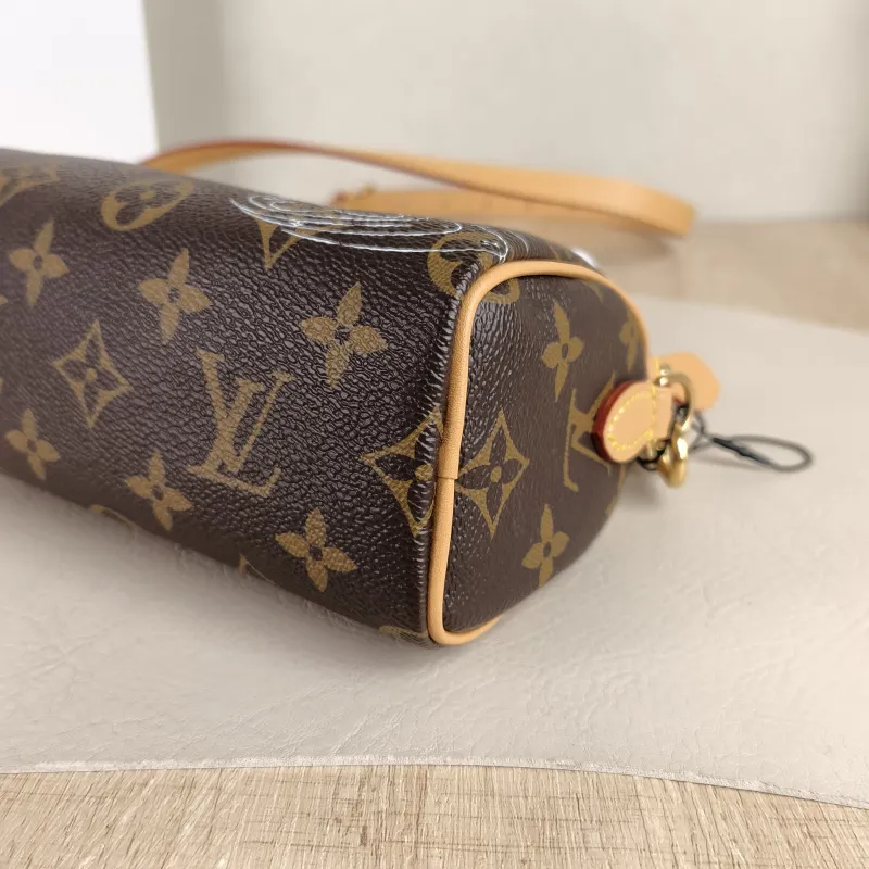 Louis Vuitton Crossbody Bag Speedy Nano Monogram · Vivienne PVC nano 16 × 7.5 × 10 cm — detail view 7 of 10