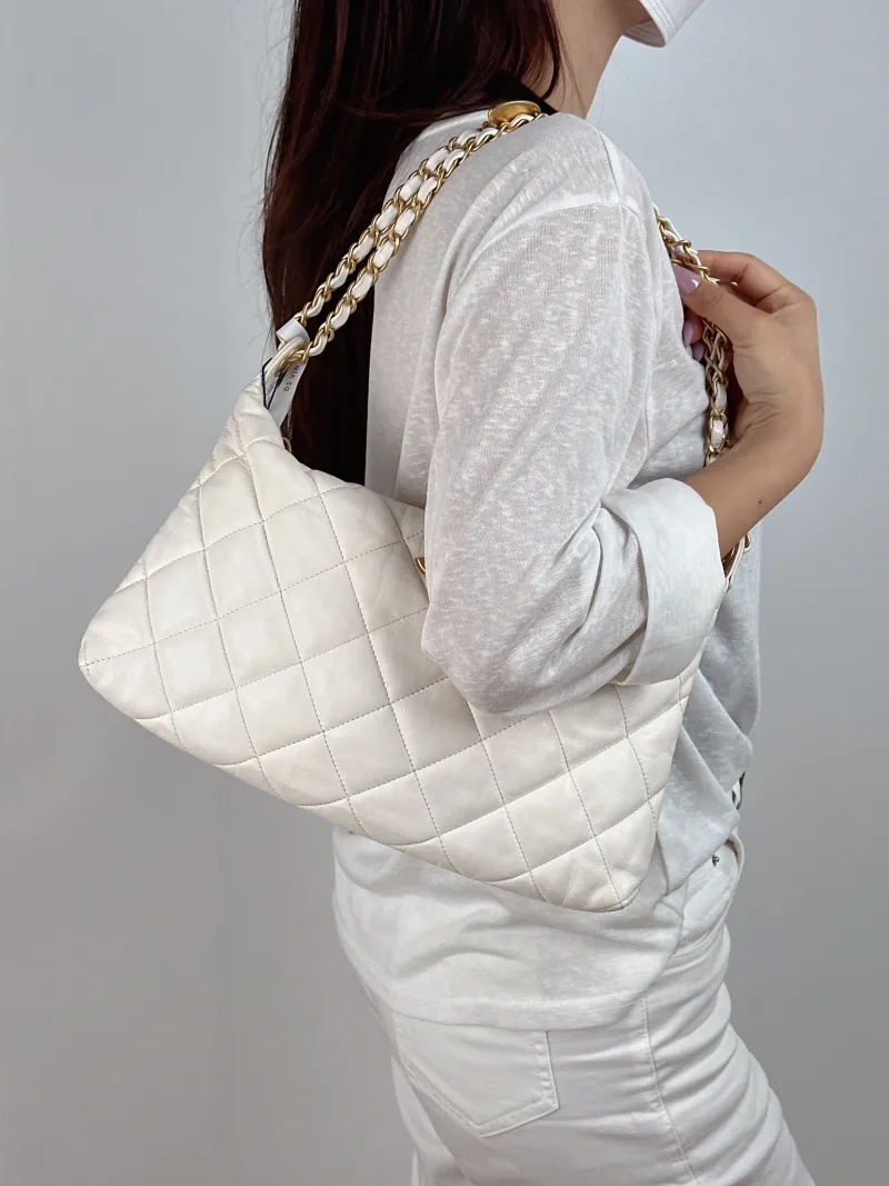 Chanel Shoulder Bag hobo White Lambskin Large 32 × 4 × 20 cm — on-model view 1 of 2