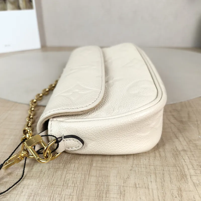 Louis Vuitton Crossbody Bag IVY White Monogram Empreinte Embossed Calfskin Small 23.5 × 4.3 × 12 cm — detail view 10 of 11