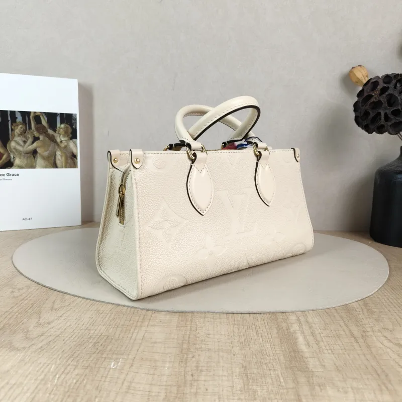 Louis Vuitton Crossbody Bag Onthego East West Two Straps White Empreinte Embossed Calfskin Small 25 × 10 × 13 cm — cover view 4 of 6