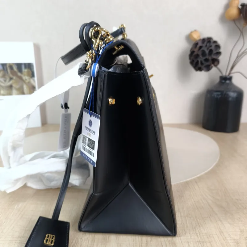 BALENCIAGA Crossbody Bag Top Handle Crossbody Bag Black Calfskin One Size 28 × 12 × 23 cm — detail view 9 of 13