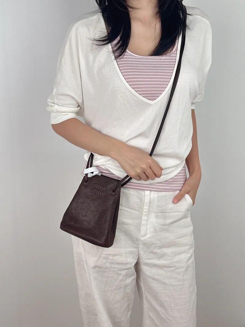 Miumiu Crossbody Bag logo Brown Lambskin One Size 14 × 6 × 16.5 cm — on-model view 2 of 2