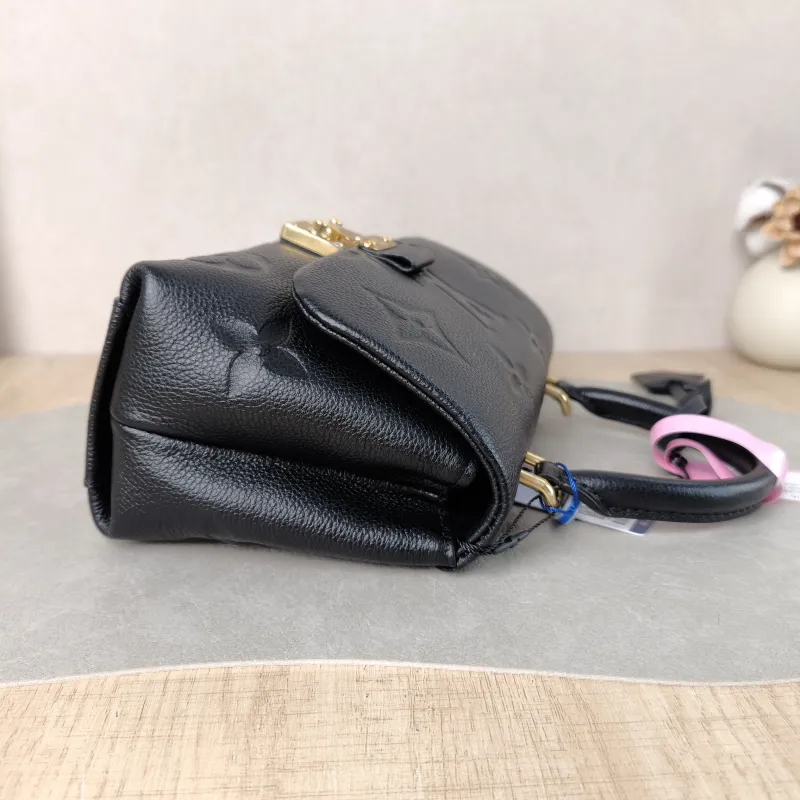Louis Vuitton Crossbody Bag MADELEINE Black Monogram Empreinte Embossed Calfskin BB 24 × 8.5 × 17 cm — detail view 5 of 12