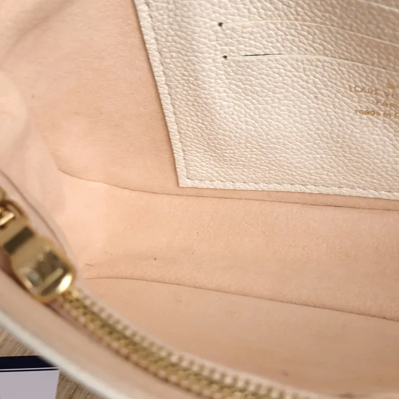 Louis Vuitton Crossbody Bag IVY White · Pink Monogram Empreinte Embossed Calfskin Small 23.5 × 4.3 × 12 cm — detail view 7 of 13