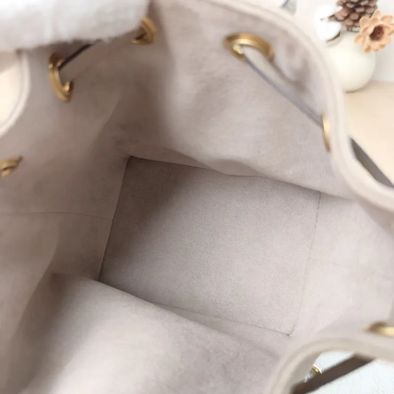 Louis Vuitton Crossbody Bag NANO NOÉ Bucket Bag Nano · White Empreinte Embossed Calfskin Monogramnano13 × 10 × 16 cm — detail view 5 of 15
