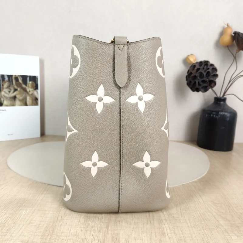 Louis Vuitton Shoulder Bag NÉONOÉ Bucket Bag · White Monogram Empreinte Embossed Calfskin Medium 26 × 17.5 × 26 cm — detail view 9 of 13