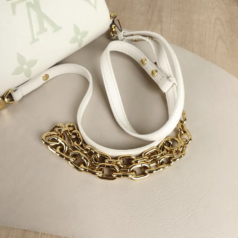 Louis Vuitton Crossbody Bag Favorite White · Green Empreinte Embossed Calfskin Monogram Medium24 × 9 × 14 cm — detail view 10 of 10