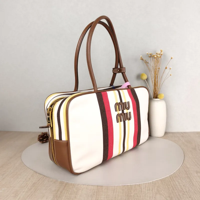 Miumiu Top Handle Bag Beau Colorblock Canvas · Calfskin Large 34 × 10 × 23 cm — cover view 3 of 5