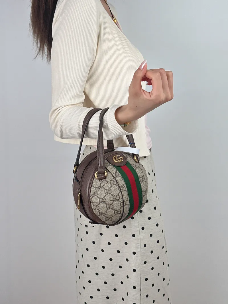 GUCCI Top Handle Bag Ophidia Top Handle Bag Monogram PVC Mini 16 × 16 × 16 cm — on-model view 2 of 2