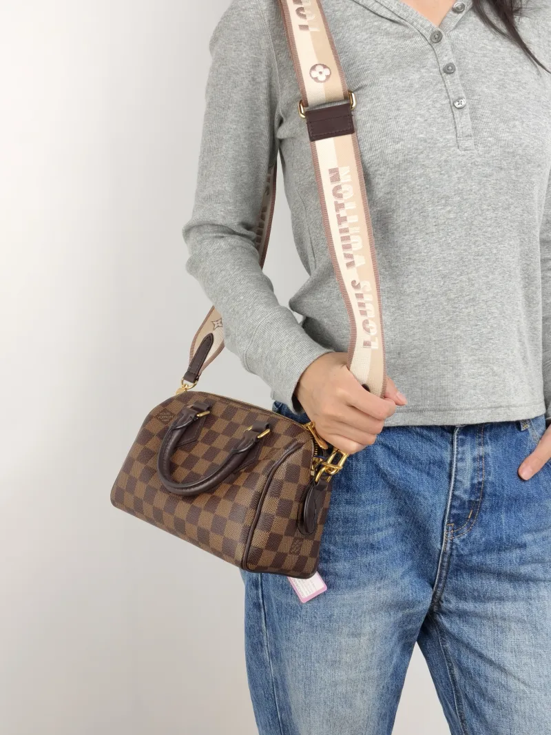 Louis Vuitton Crossbody Bag Speedy20 Shoulder Strap PVC Small 20.5 × 12 × 13.5 cm — on-model view 1 of 3