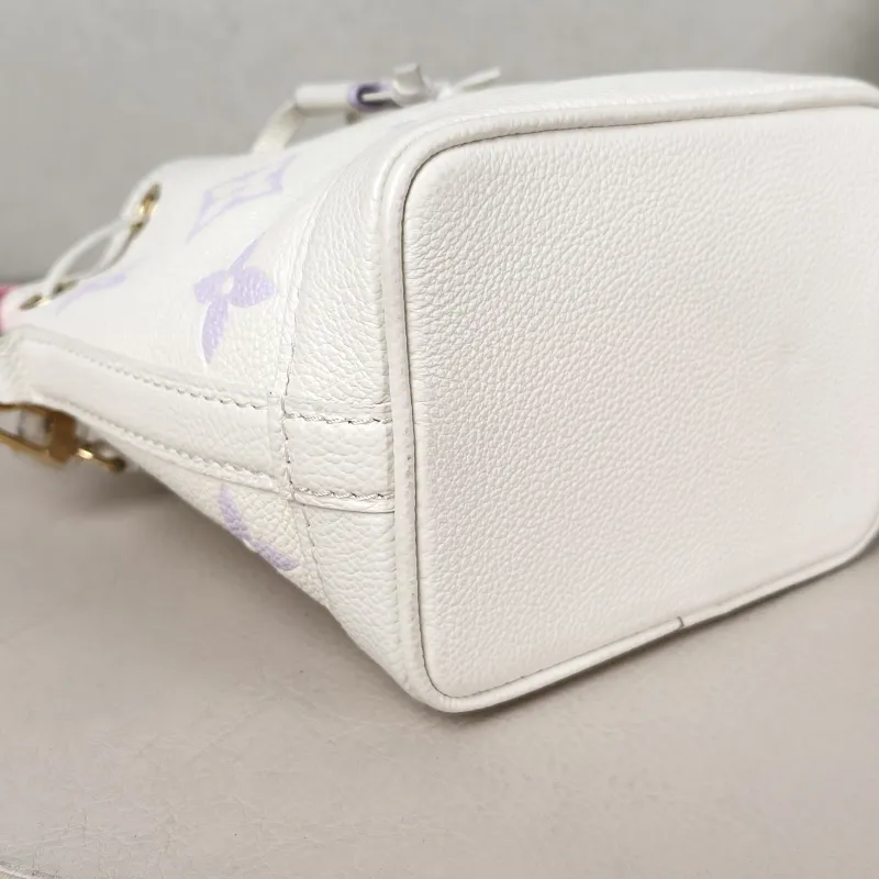 Louis Vuitton Crossbody Bag NANO NOÉ Bucket Bag Nano White · Monogram Empreinte Embossed Calfskin nano 13 × 10 × 16 cm — detail view 6 of 9