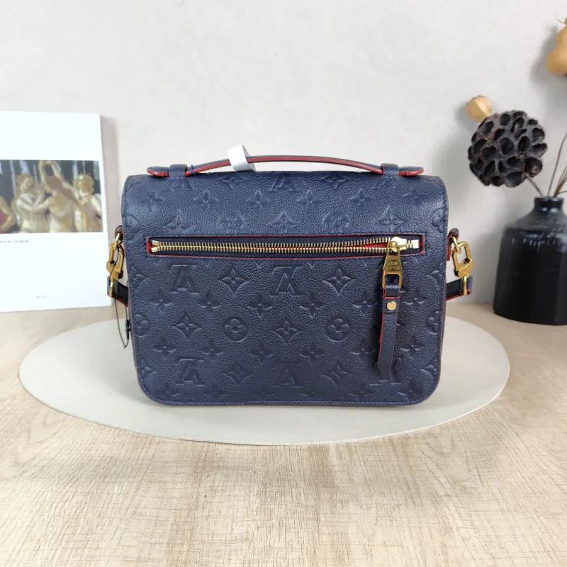 Louis Vuitton Crossbody Bag Pochette Métis · Monogram Empreinte Embossed Calfskin Medium 25 × 7 × 19 cm — cover view 4 of 5
