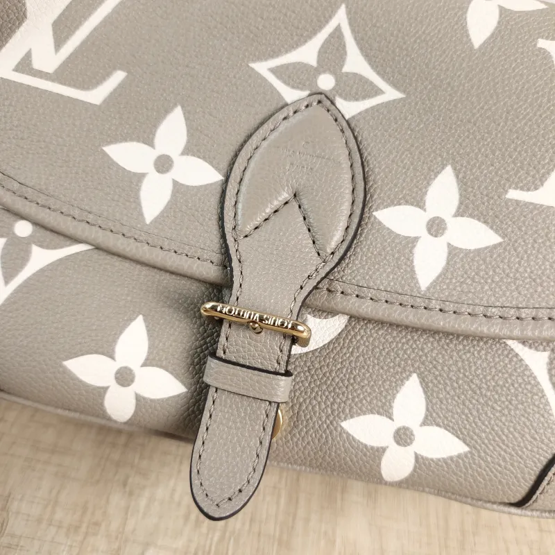 Louis Vuitton Crossbody Bag Diane Baguette Bag Monogram Empreinte Embossed Calfskin Small 24 × 9 × 15 cm — detail view 4 of 13