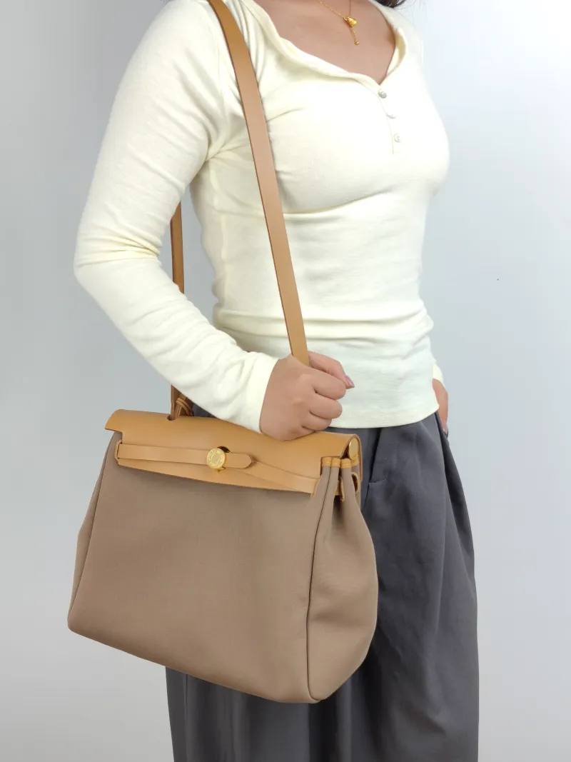 Hermès Crossbody Bag Herbag 31 Calfskin，Canvas Medium 30.5 × 11 × 25.5 cm B — on-model view 2 of 2