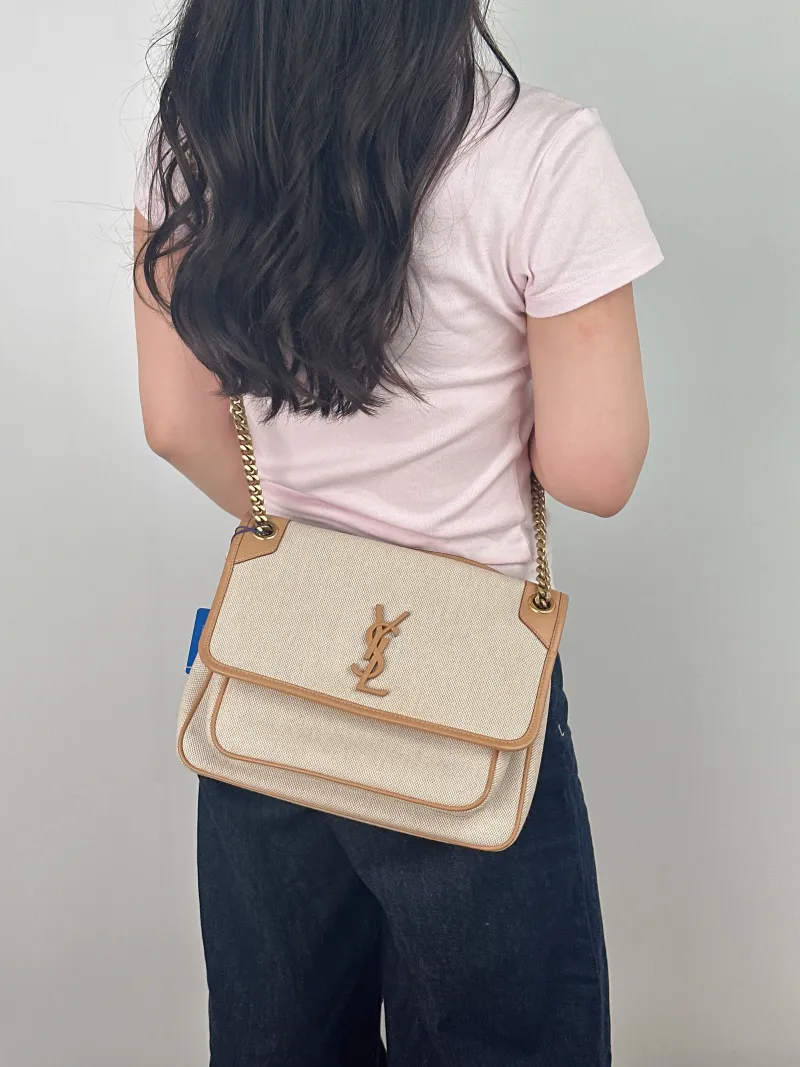 SAINT LAURENT Crossbody Bag Niki D Beige Brown Canvas Medium 28 × 8.5 × 20 cm — on-model view 2 of 2