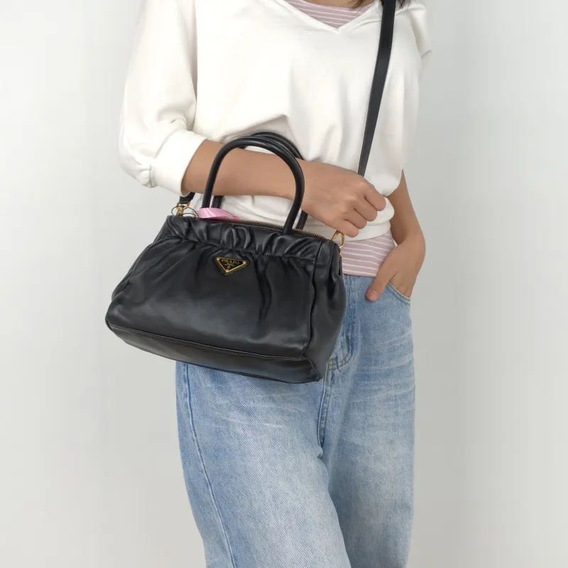 PRADA Crossbody Bag Black with Gold-Tone Hardware Crossbody Bag Black Lambskin One Size26 × 11 × 17 cm — on-model view 3 of 3