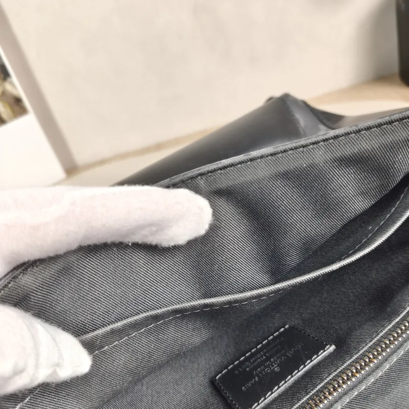 Louis Vuitton Crossbody Bag Voyager Messenger Bag Monogram PVC Small33 × 11 × 22.5 cm — detail view 1 of 13