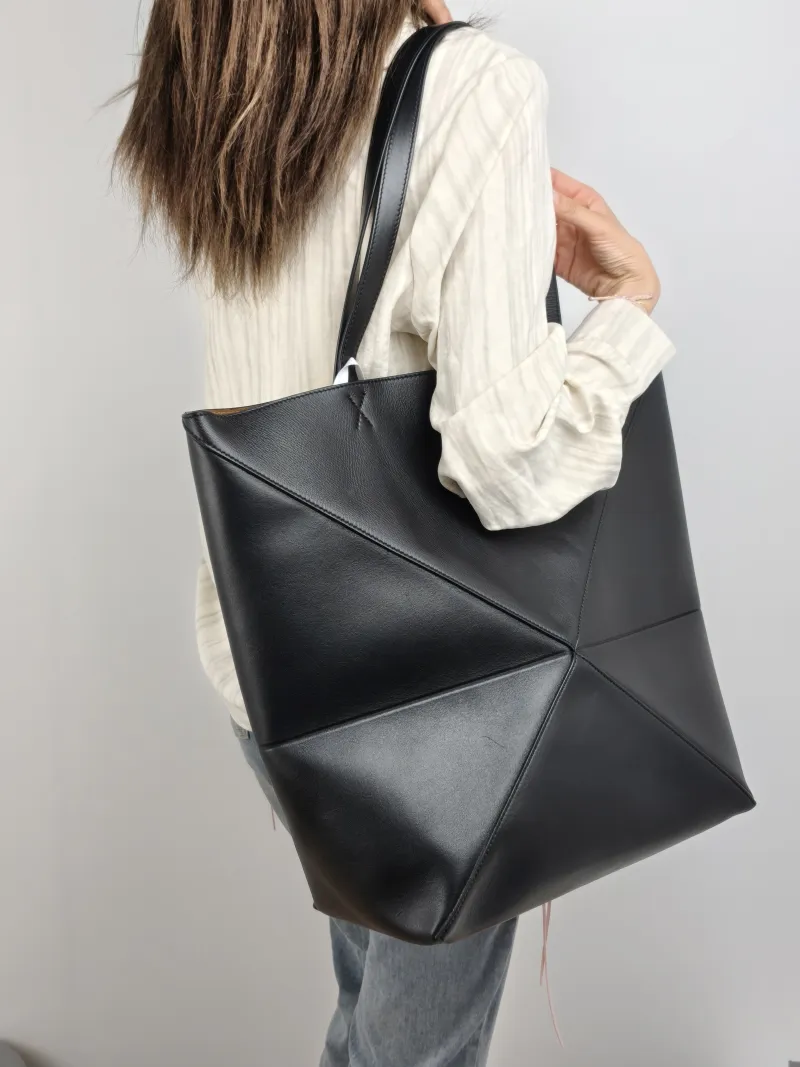 LOEWE Top Handle Bag Puzzle Fold Shopping Tote Black CC alfskin Large 42 × 41 × 18 cm — on-model view 1 of 2