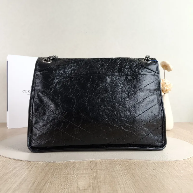 SAINT LAURENT Crossbody Bag Niki Black Calfskin Large 32 × 9 × 23 cm — cover view 4 of 5