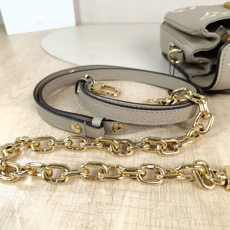 Louis Vuitton Crossbody Bag Pochette Métis East West Monogram Empreinte Embossed Calfskin Small 21.5 × 6 × 13.5 cm — detail view 2 of 13