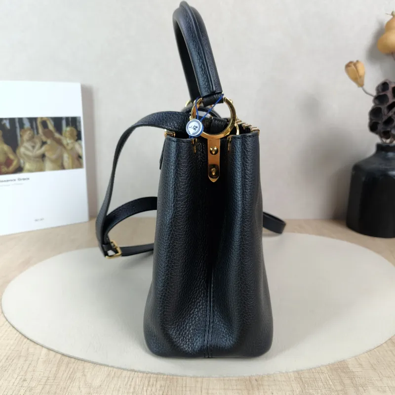 Louis Vuitton Top Handle Bag Capucines Black · Calfskin Medium31.5 × 11 × 20 cm — detail view 13 of 14