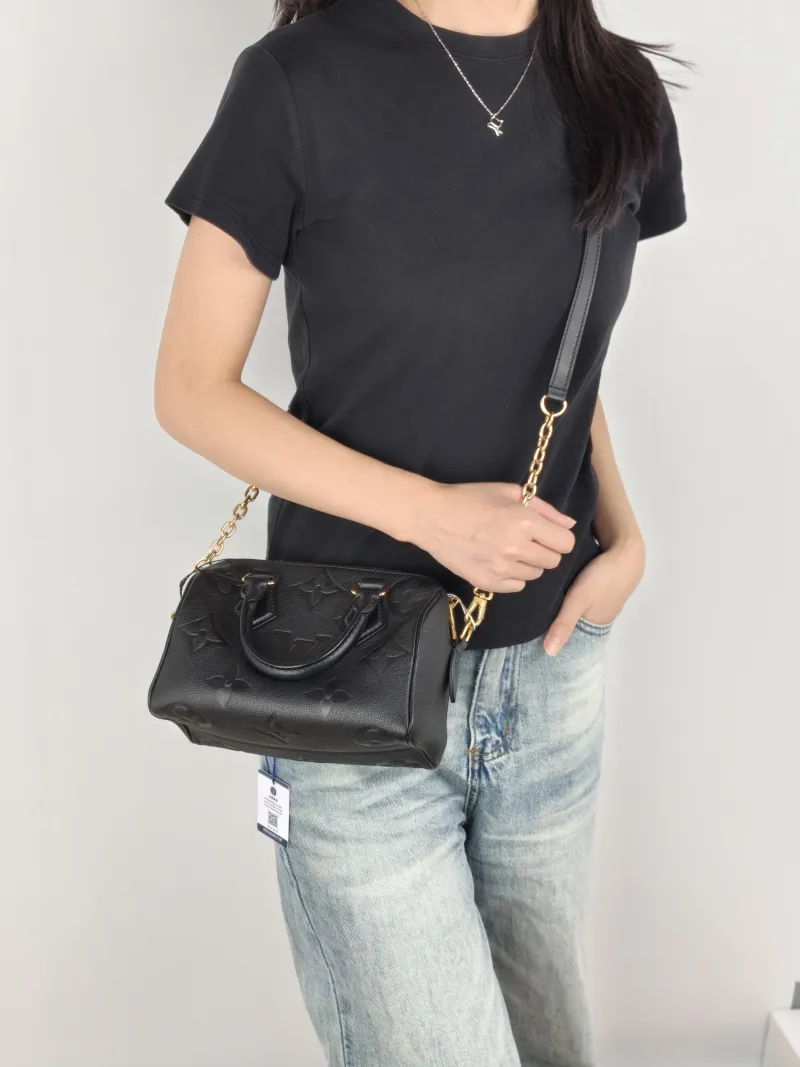 Louis Vuitton Crossbody Bag Speedy20Black Calfskin Small20.5 × 12 × 13.5 cm — on-model view 1 of 3