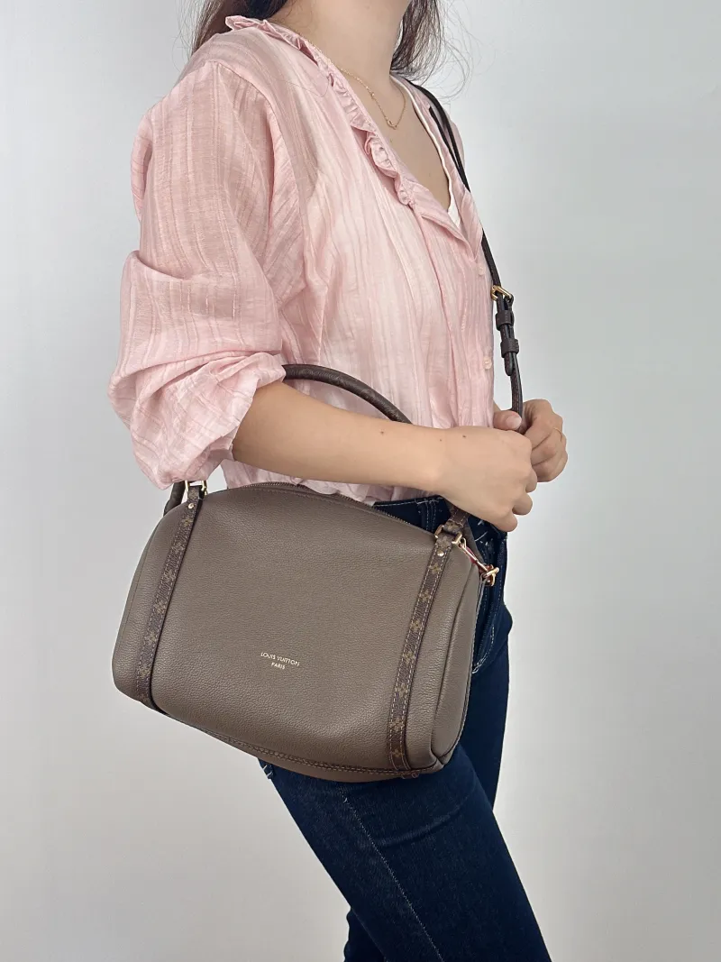 Louis Vuitton Shoulder Bag EXPRESS Shoulder Bag Grey Calfskin Small 26 × 13.5 × 17 cm — on-model view 1 of 2