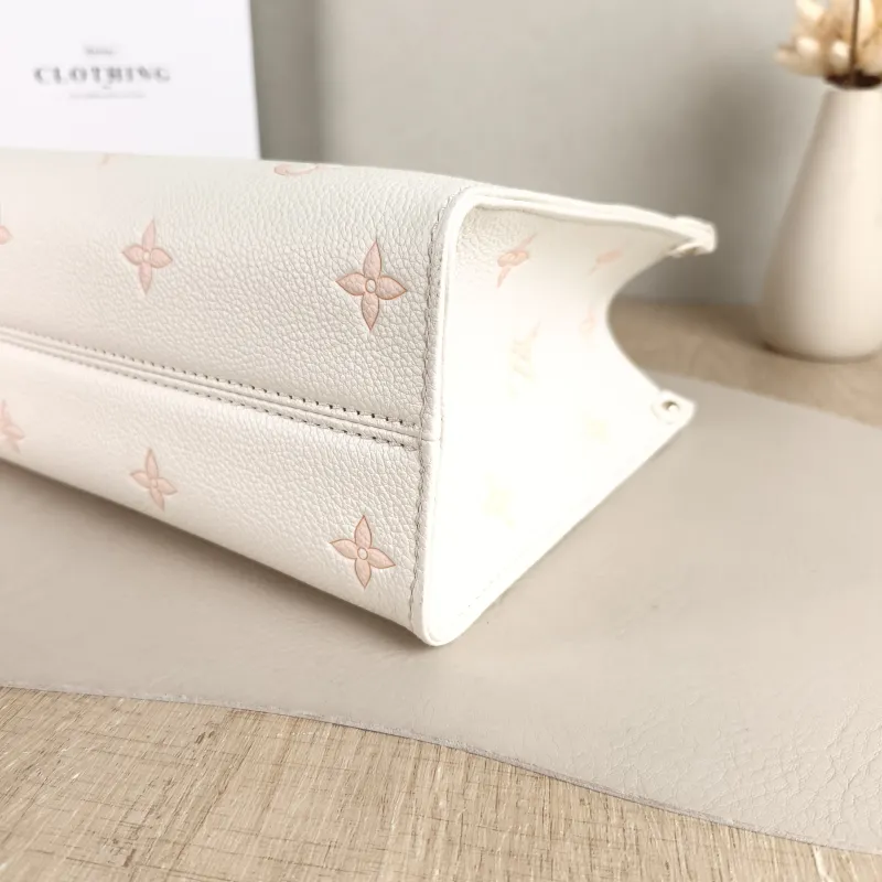 Louis Vuitton Shoulder Bag Onthego Beige · Pink Monogram Empreinte Embossed Calfskin Small 25 × 11.5 × 19 cm — detail view 3 of 12