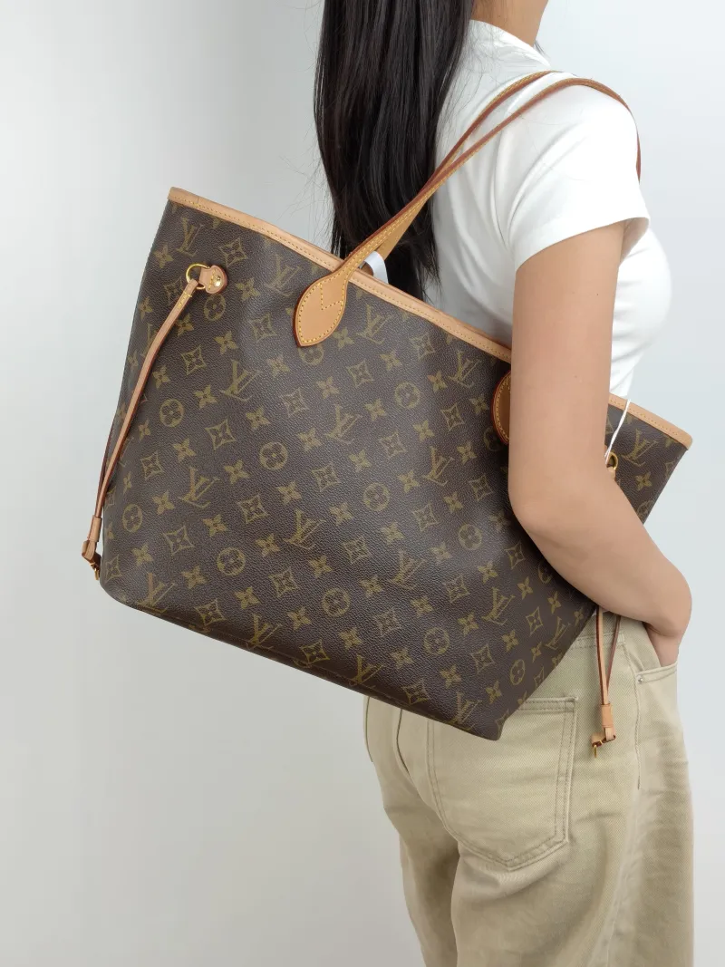 Louis Vuitton Shoulder Bag Neverfull Monogram PVC Medium 31 × 14 × 28 cm — on-model view 1 of 2