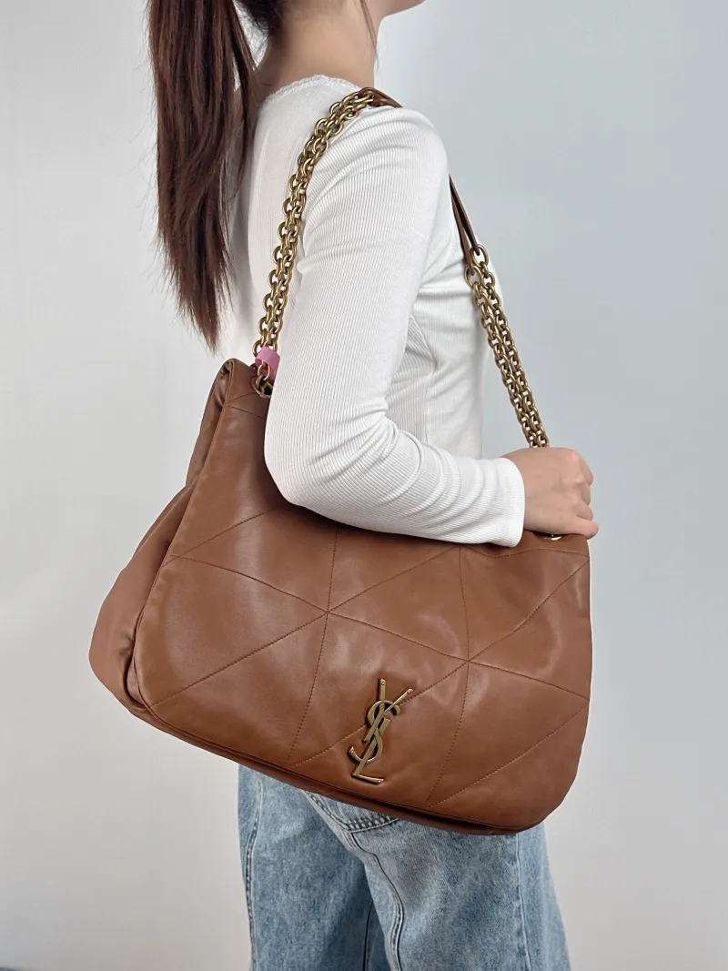 SAINT LAURENT Crossbody Bag Jamie 4.3 Chain Bag Caramel Lambskin Large 43 × 9 × 29 cm — on-model view 1 of 2