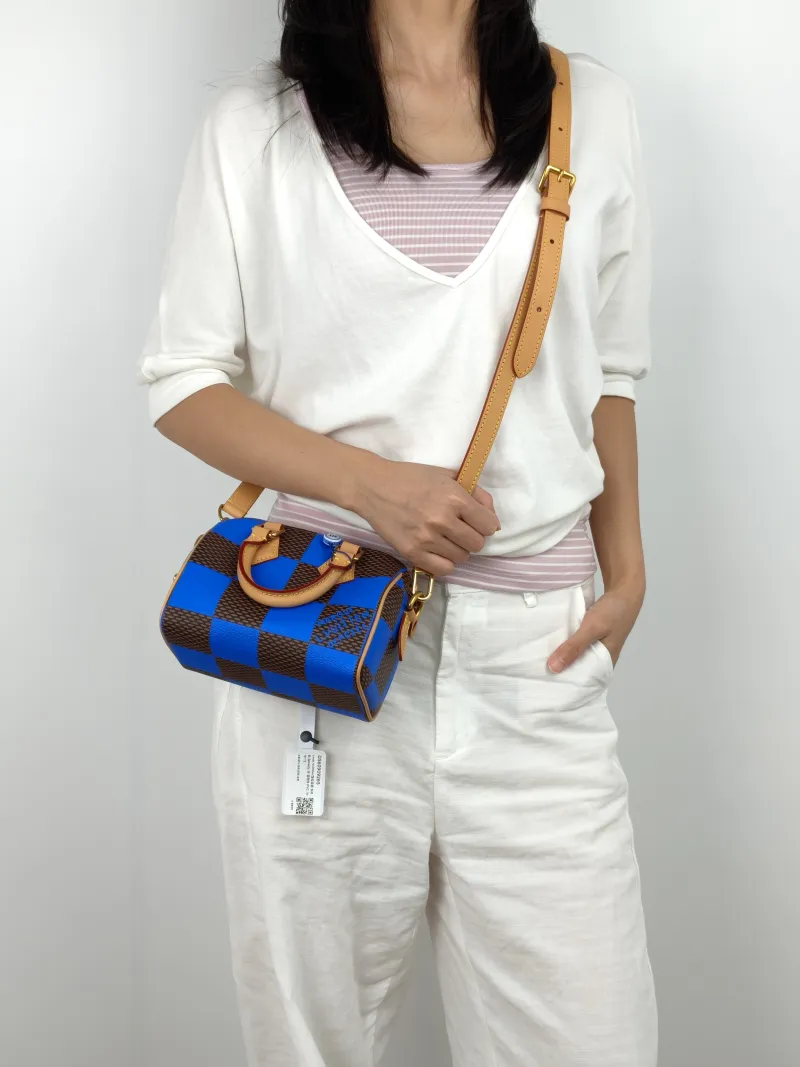 Louis Vuitton Crossbody Bag Speedy 18 PVC 18 × 10 × 12 cm — on-model view 1 of 4