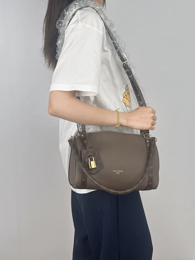 Louis Vuitton Shoulder Bag EXPRESS Shoulder Bag Grey Calfskin Small26 × 13.5 × 17 cm — on-model view 1 of 2