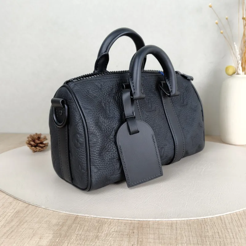 Louis Vuitton Crossbody Bag Keepall 25 Taurillon Embossed Calfskin Monogram Medium25 × 11 × 15 cm — cover view 2 of 5