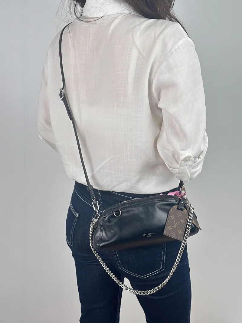 Louis Vuitton Shoulder Bag Pochette Vibe Black SL ambskin One Size 25 × 7.5 × 10 cm — on-model view 2 of 2
