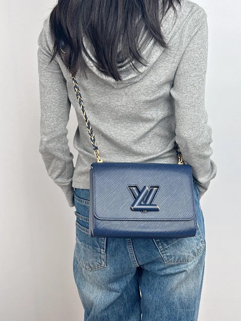 Louis Vuitton Crossbody Bag Twist Blue Calfskin Medium 23 × 9.5 × 17 cm — on-model view 1 of 2