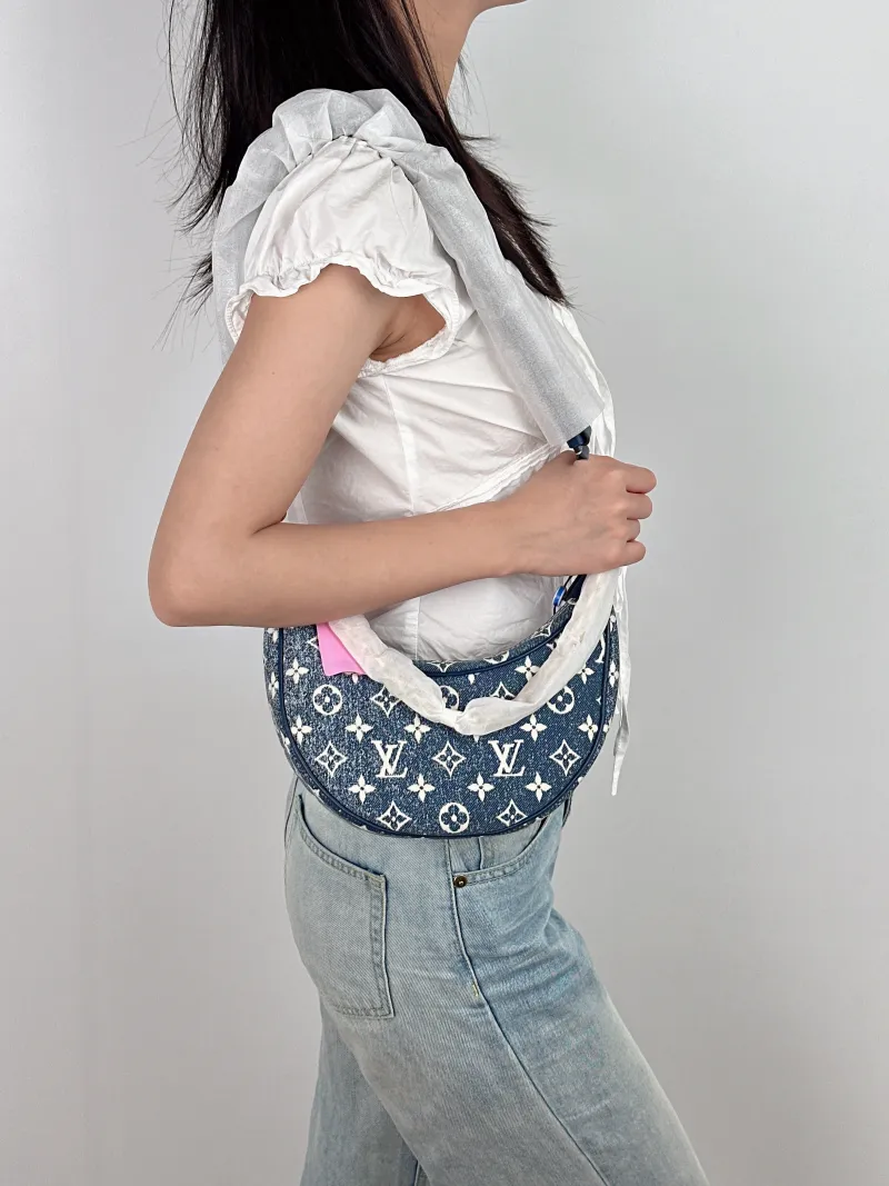 Louis Vuitton Crossbody Bag Loop Blue Small 23 × 6 × 13 cm — on-model view 3 of 3