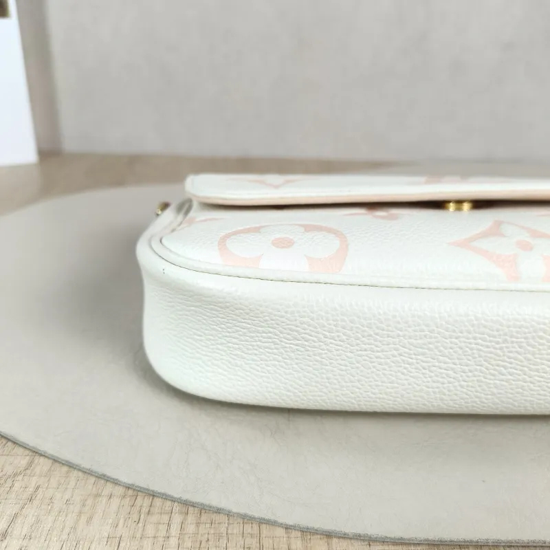 Louis Vuitton Crossbody Bag IVY White · Pink Empreinte Embossed Calfskin Small 23.5 × 4.3 × 12 cm — detail view 12 of 12