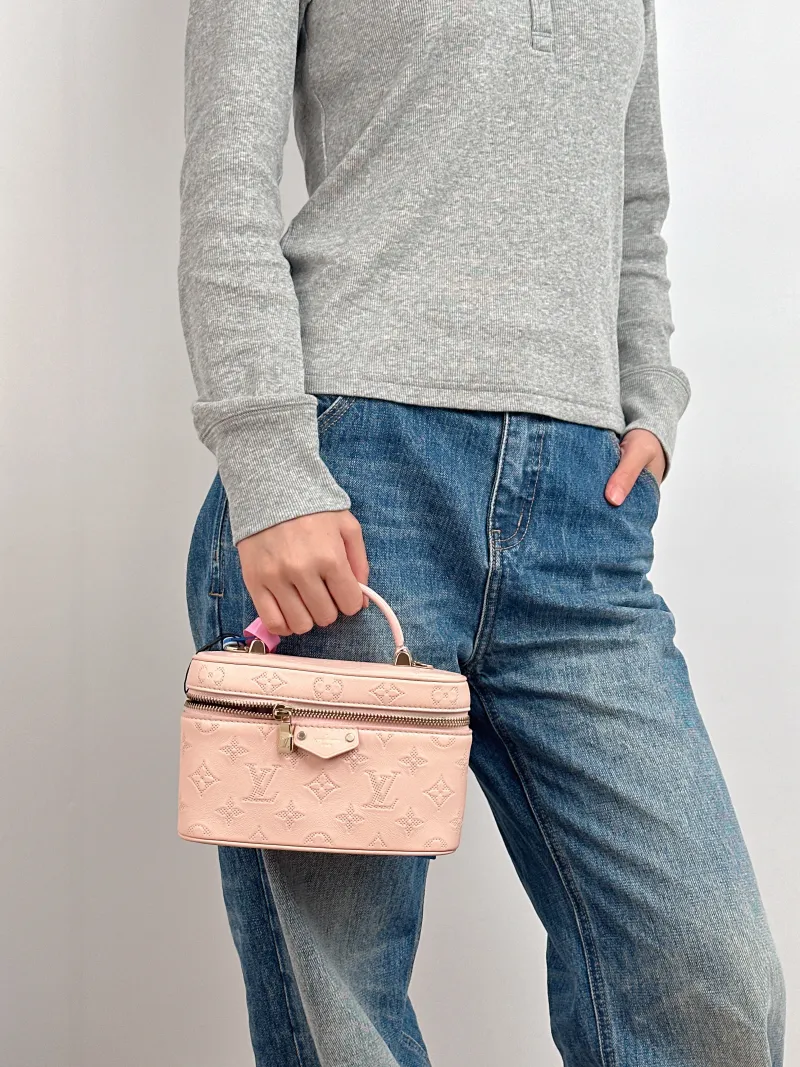 Louis Vuitton Shoulder Bag VANITY POUCH Cosmetic Bag Pink Calfskin One Size 19 × 6.5 × 11.5 cm — on-model view 1 of 3