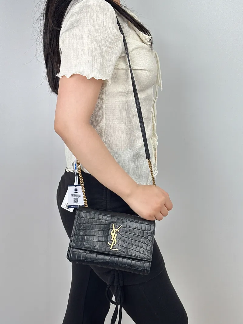 SAINT LAURENT Crossbody Bag SUNSET Black with Gold-Tone Hardware Calfskin Small19.5 × 8 × 14 cm — on-model view 1 of 2