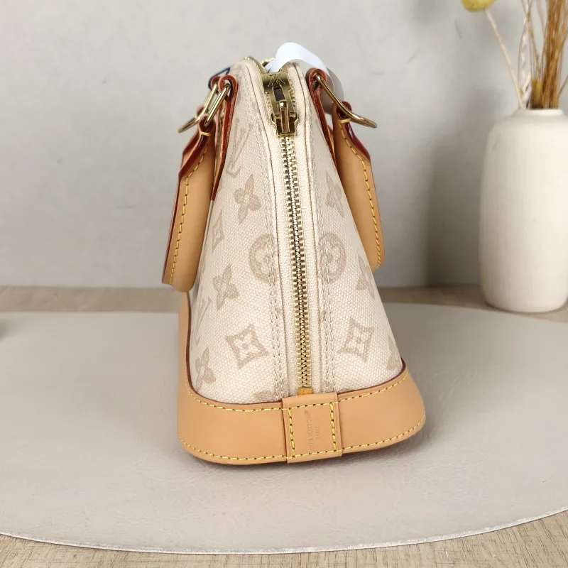 Louis Vuitton Top Handle Bag Alma BB PVCBB23.5 × 11.5 × 17.5 cm — detail view 8 of 12